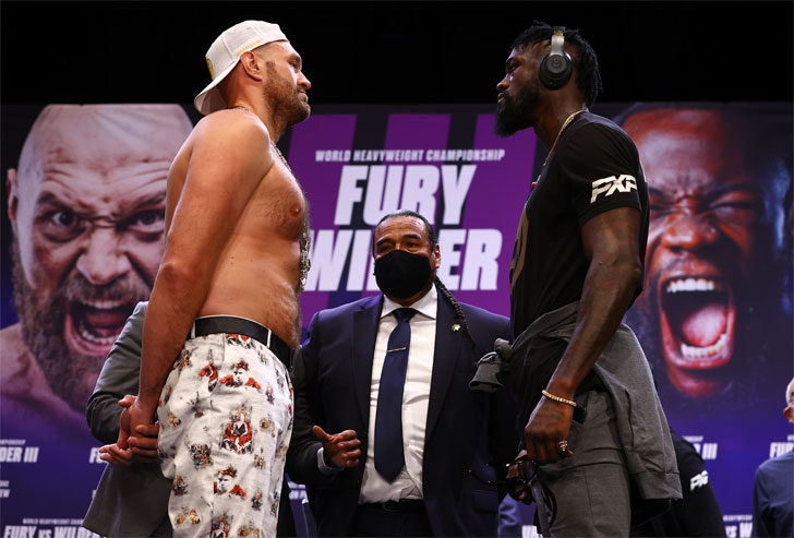 Deontay Wilder with Tyson Fury Deontay Wilder with Tyson Fury